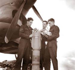 Loading propaganda leaflets into a T3 leaflet bomb,