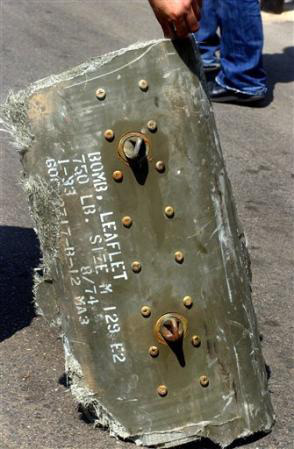 Fragment of an American-made M129 E2 leaflet bomb