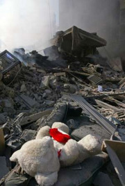 Pristine teddy bear amongst bomb damage in Lebanon