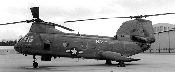 A left side view of an HH-46A Sea Knight helicopter equipped with the 1400-watt AEM-SYS-2 sound system and related loudspeaker, visible here on the helicopter's exterior left front
